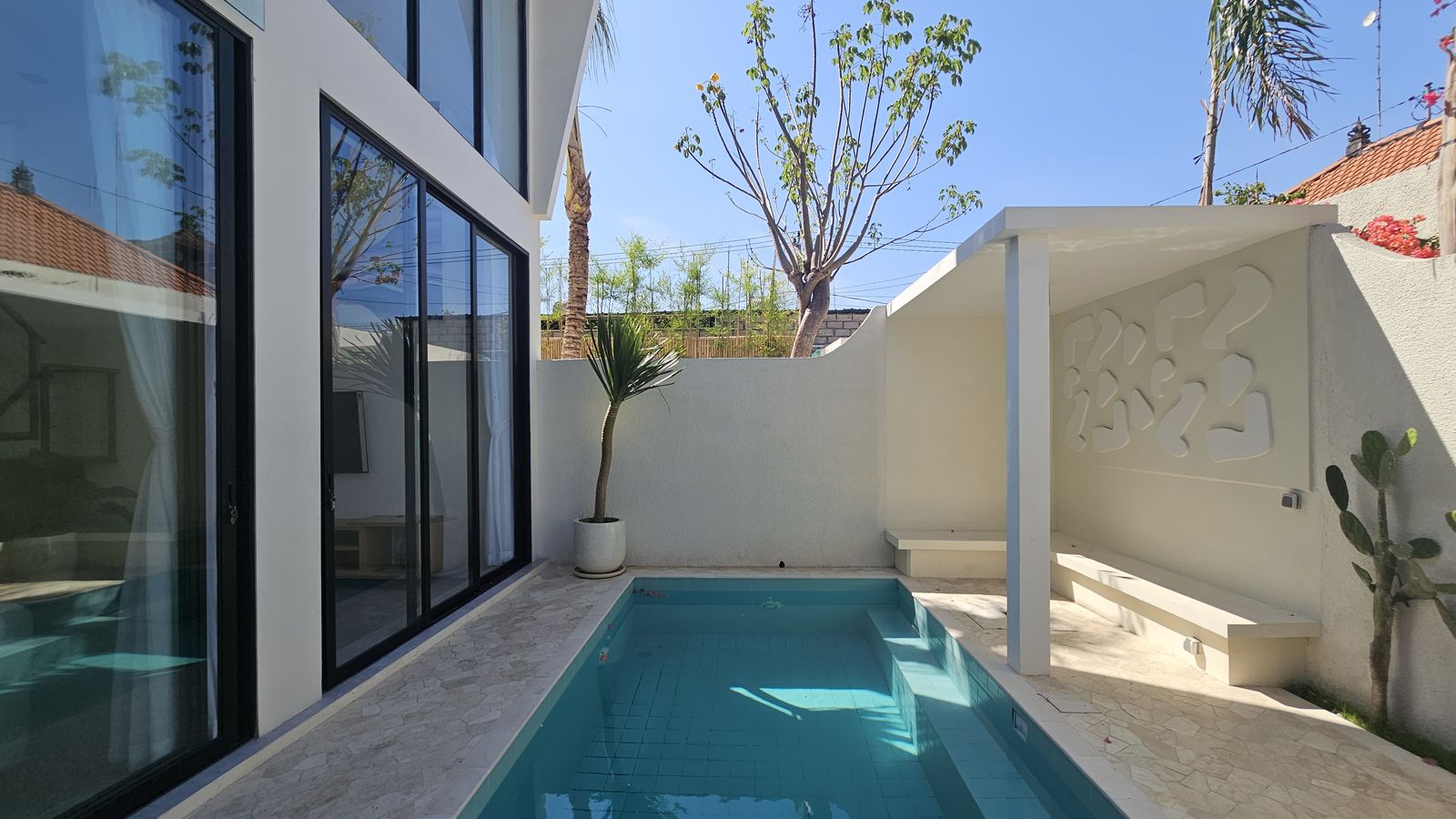 Pool and glazed corner at La Tiara Canggu